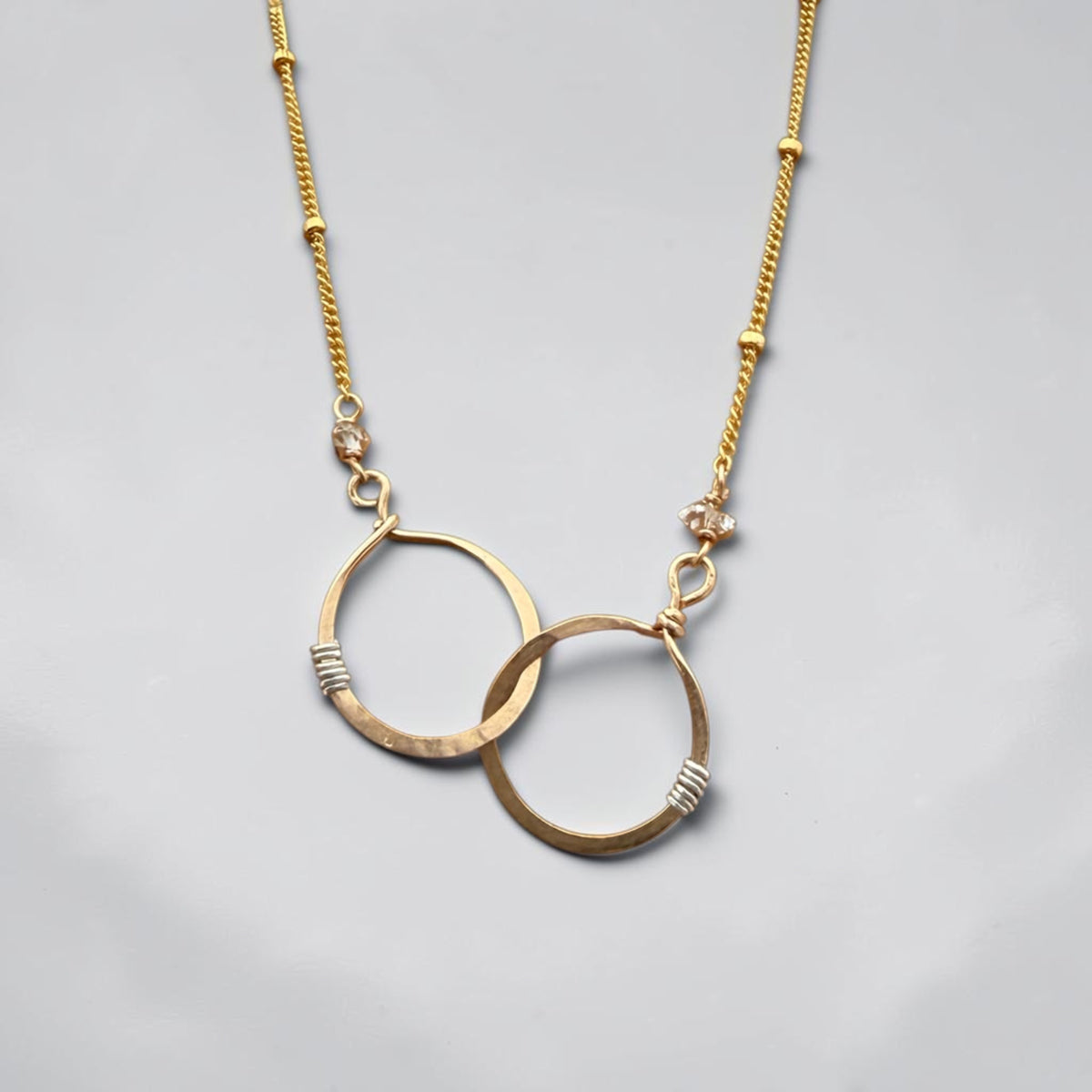 Double gold ring necklace